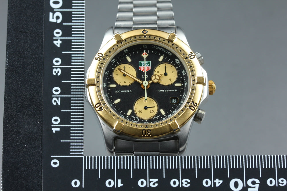 Near MINT TAG Heuer Professional 2000 565.306R Black/Gold Quartz 34mm Men's Watch