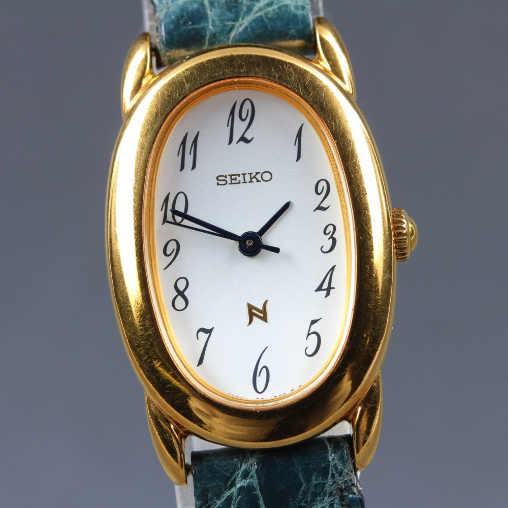 Near MINT SEIKO Neue 1F21-5B70 White Quartz 21mm Ladies Watch