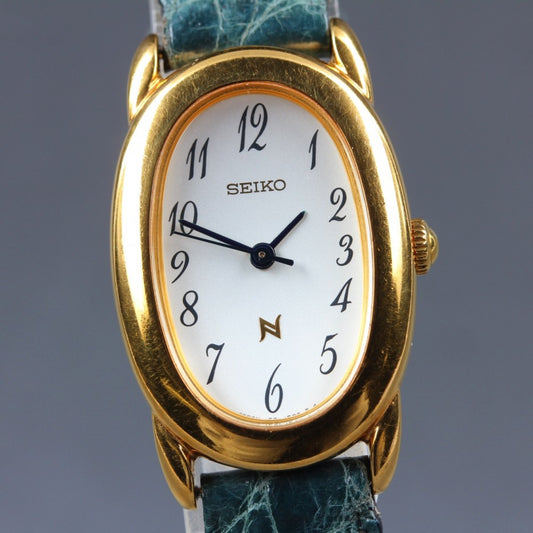 Near MINT SEIKO Neue 1F21-5B70 White Quartz 21mm Ladies Watch