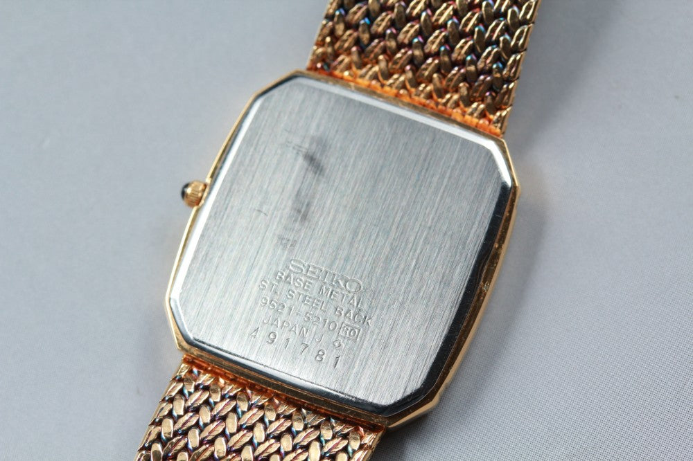 Near MINT SEIKO Dolce 9521-5210 Gold Quartz 27mm Men's Watch 1984