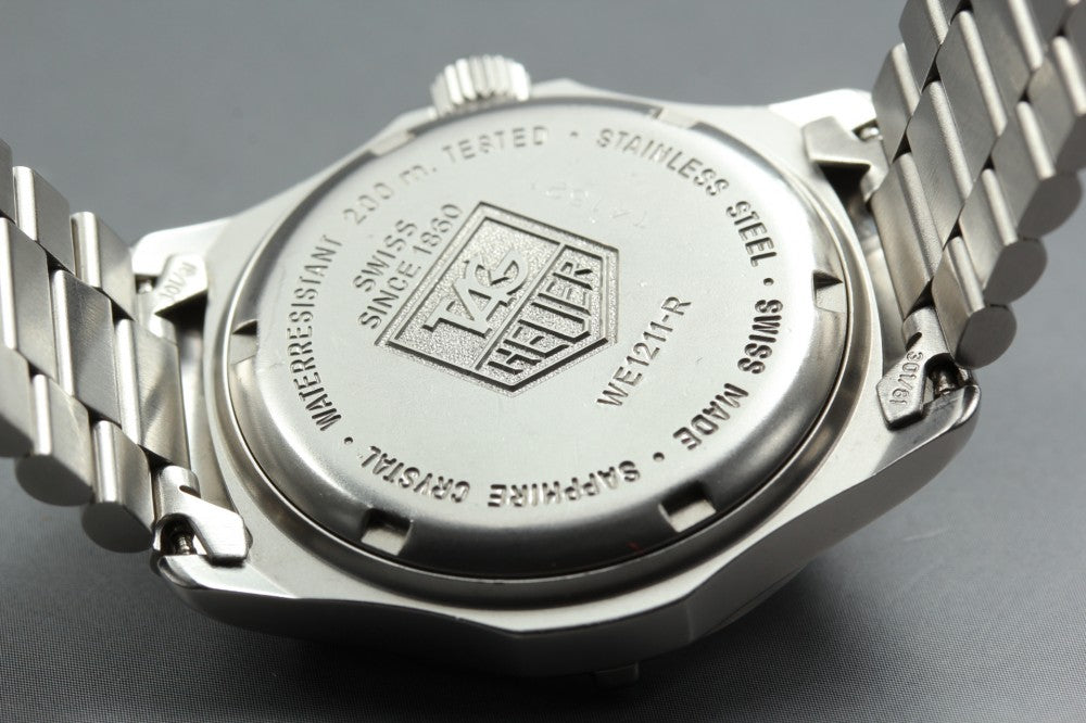 Near MINT TAG Heuer 2000 Series WE1211-R Grey Quartz 34mm Men's Watch