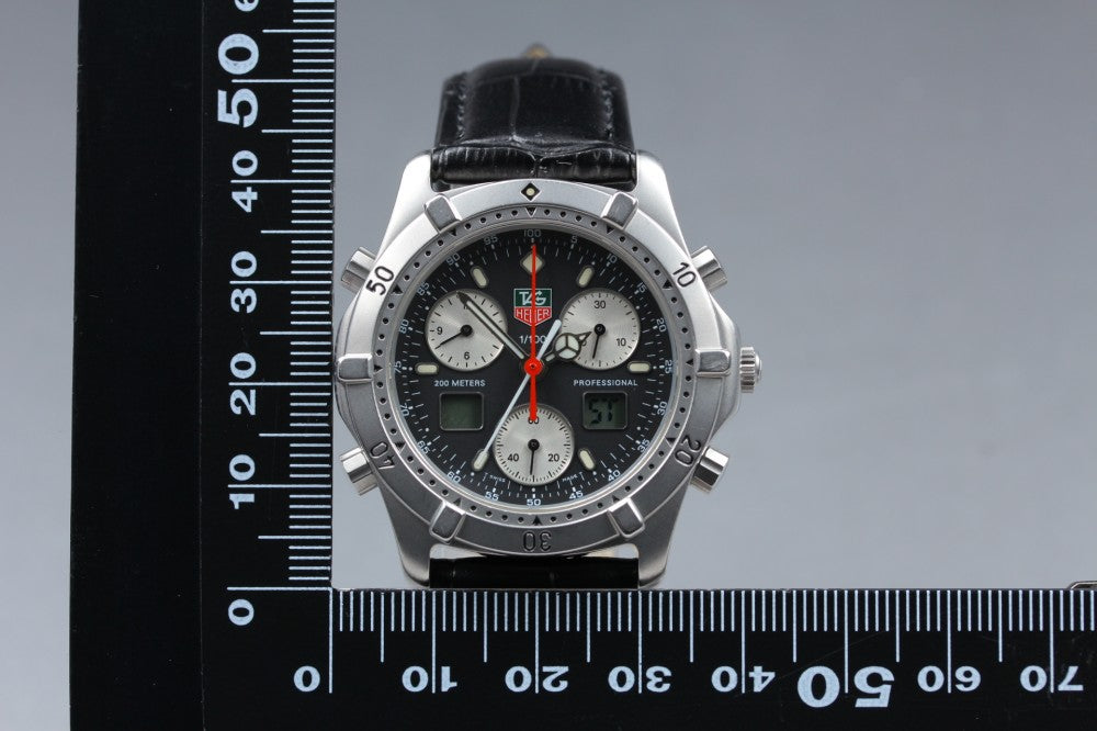 Near MINT TAG Heuer Professional 2000 CE1114 Black Quartz 38.2mm Men's Watch