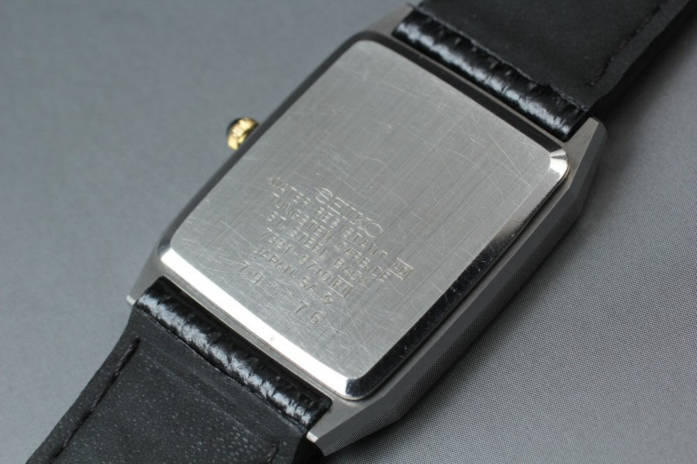 Near MINT SEIKO Dolce 7321-5710 Black Quartz 25.2mm Men's Watch 1987