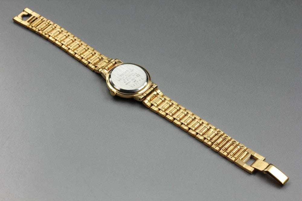 Near MINT SEIKO SX V401-0671 Black Quartz 22.8mm Ladies Watch 1993