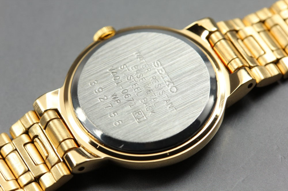 Near MINT SEIKO SX V401-0671 Black Quartz 22.8mm Ladies Watch 1993