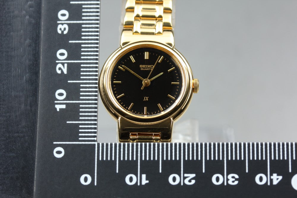 Near MINT SEIKO SX V401-0671 Black Quartz 22.8mm Ladies Watch 1993