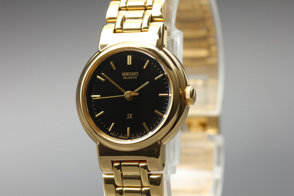 Near MINT SEIKO SX V401-0671 Black Quartz 22.8mm Ladies Watch 1993