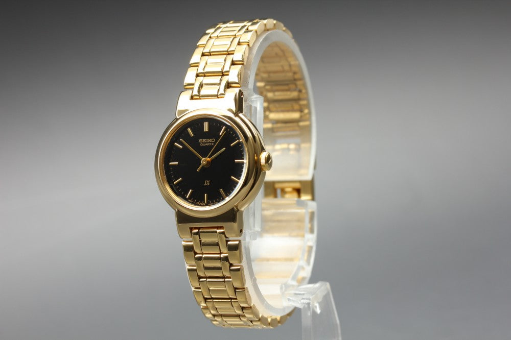 Near MINT SEIKO SX V401-0671 Black Quartz 22.8mm Ladies Watch 1993