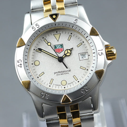 Near MINT TAG Heuer 1500 Professional WD1221-K-20 Silver Quartz 36mm Men's Watch