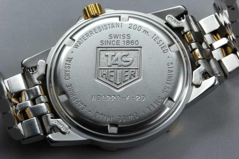 Near MINT TAG Heuer 1500 Professional WD1221-K-20 Silver Quartz 36mm Men's Watch