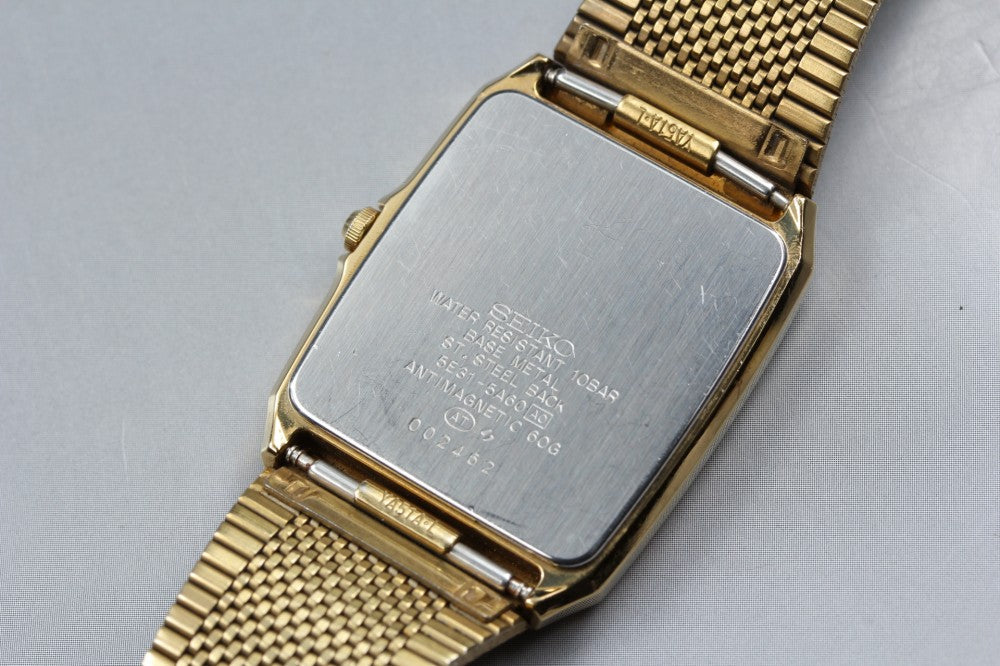 Near MINT SEIKO Spirit 5E31-5A60 Gold Quartz 29mm Men's Watch 1990