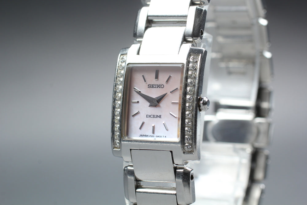 Near MINT SEIKO Exceline 1F20-0AD0 Pink Mother of Pearl Quartz 18.8mm Ladies Watch 1992