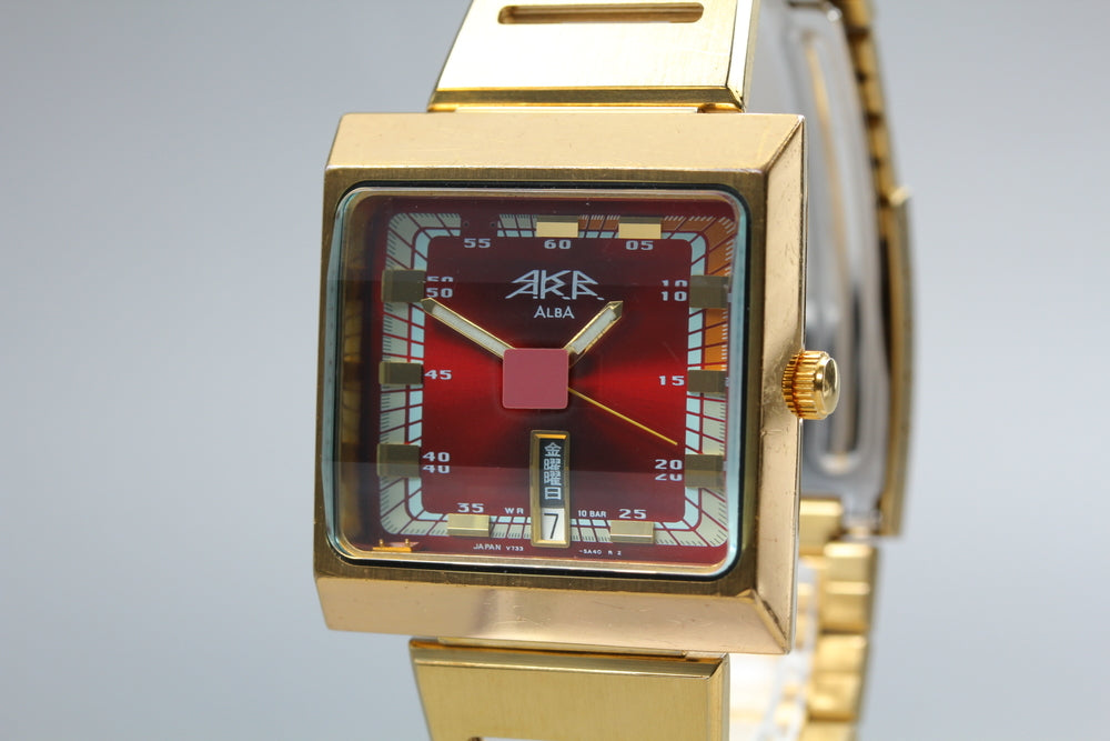 SEIKO ALBA V733-5A40 Red Quartz 34mm Men's Watch