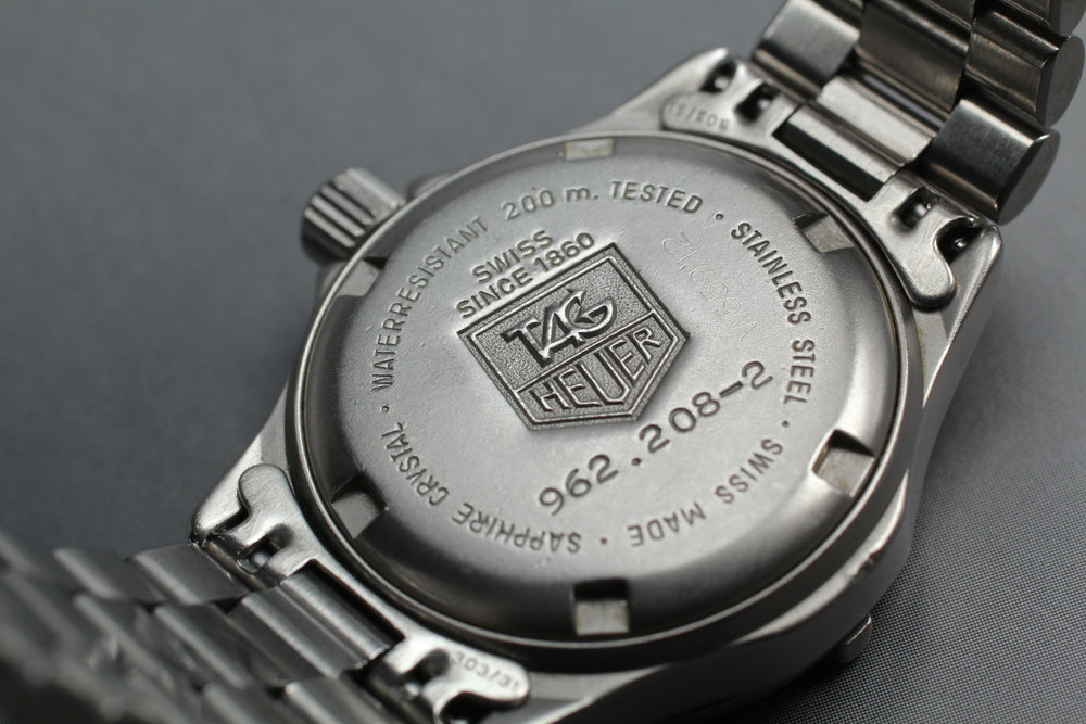 Near MINT TAG Heuer Professional 2000 962.208-2 Silver Quartz 28mm Ladies Watch