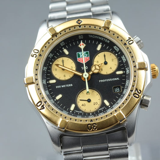 Near MINT TAG Heuer Professional 2000 565.306R Black/Gold Quartz 34mm Men's Watch