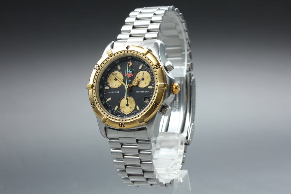 Near MINT TAG Heuer Professional 2000 565.306R Black/Gold Quartz 34mm Men's Watch
