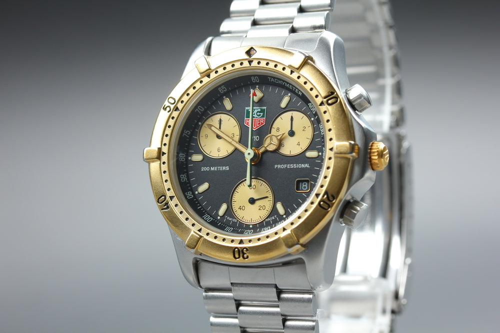 Near MINT TAG Heuer Professional 2000 565.306R Black/Gold Quartz 34mm Men's Watch
