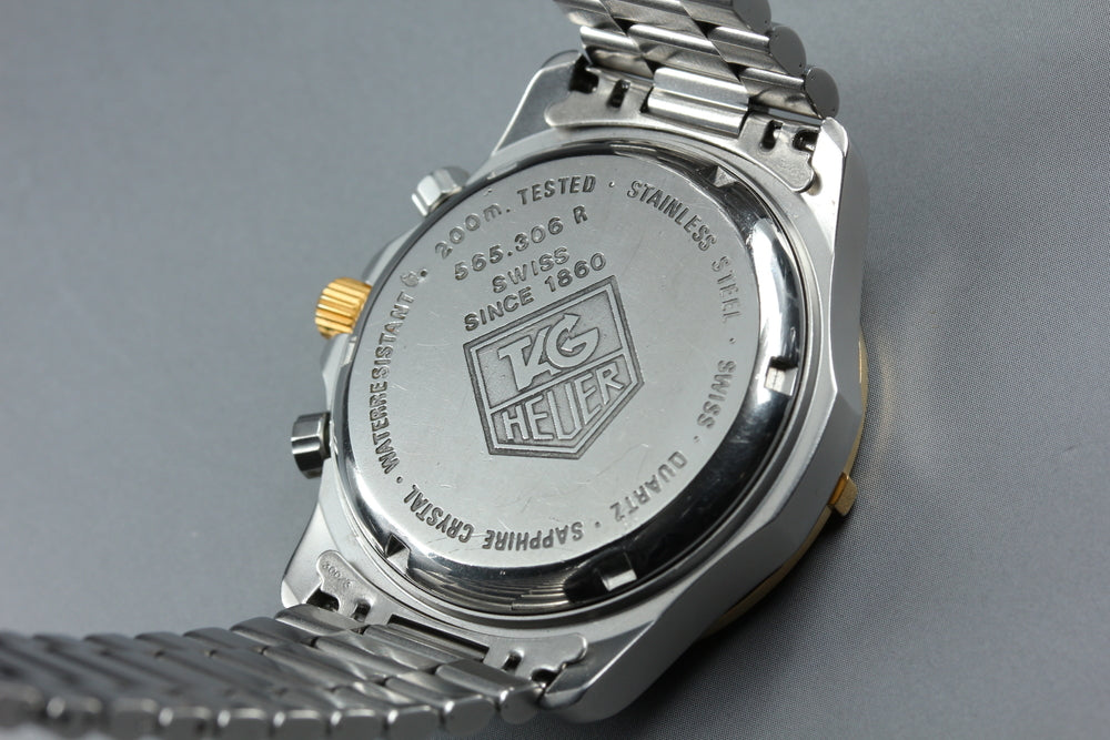 Near MINT TAG Heuer Professional 2000 565.306R Black/Gold Quartz 34mm Men's Watch