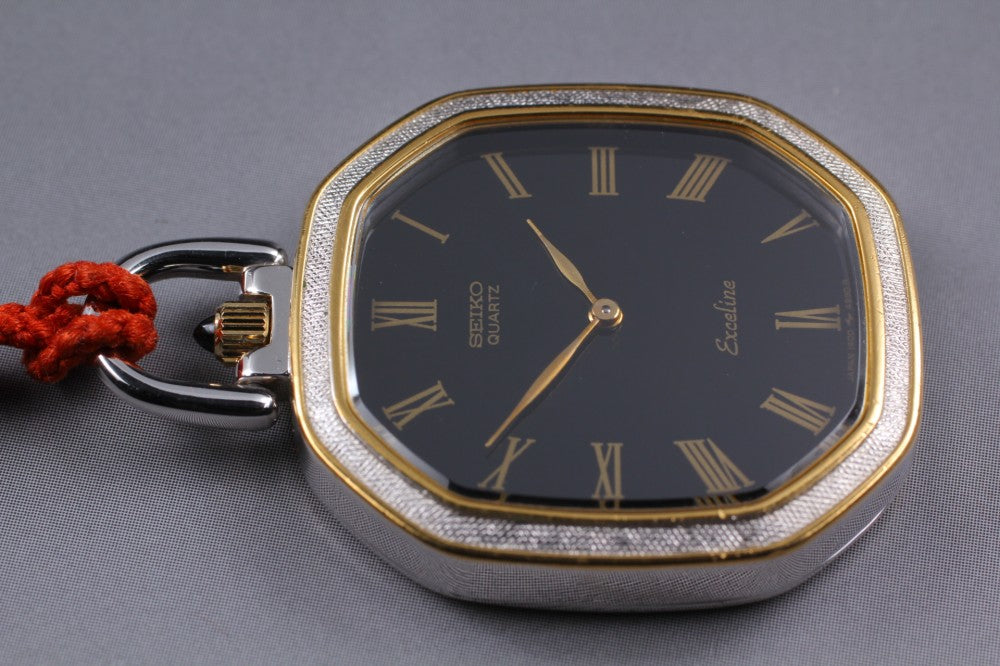 Near MINT SEIKO Exceline 1400-7760 Black Quartz 25mm Unisex Pocket Watch 1981