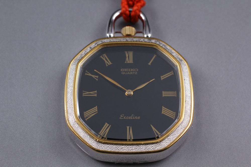 Near MINT SEIKO Exceline 1400-7760 Black Quartz 25mm Unisex Pocket Watch 1981