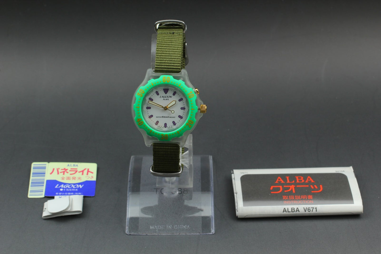 Working [As-Is] Seiko Alba V671-5A00 Green Bezel Qz Ladies Watch (Light Issue)