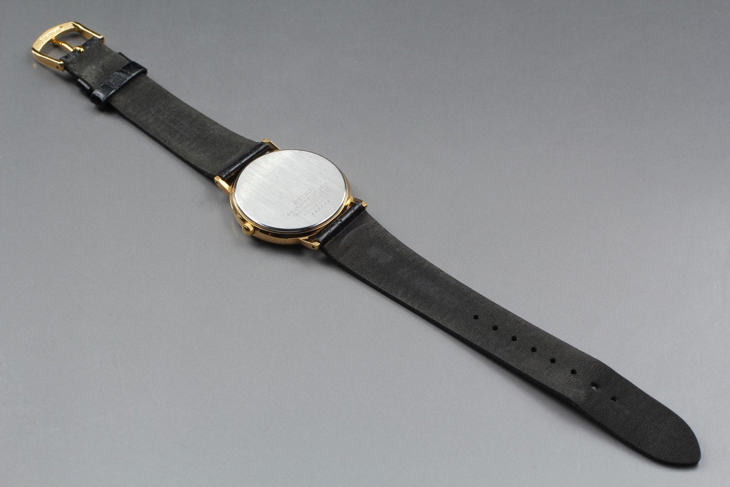 Near MINT Vintage SEIKO Rotary 100 Years 7N01-6890 Gold Quartz 32mm Men's Watch