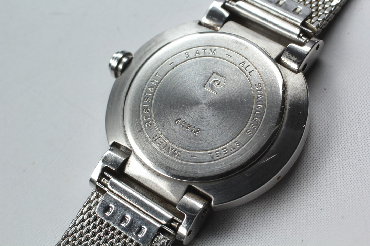 Near MINT Pierre Cardin 43312 Black Cross Dial Silver Quartz 29mm Ladies Watch