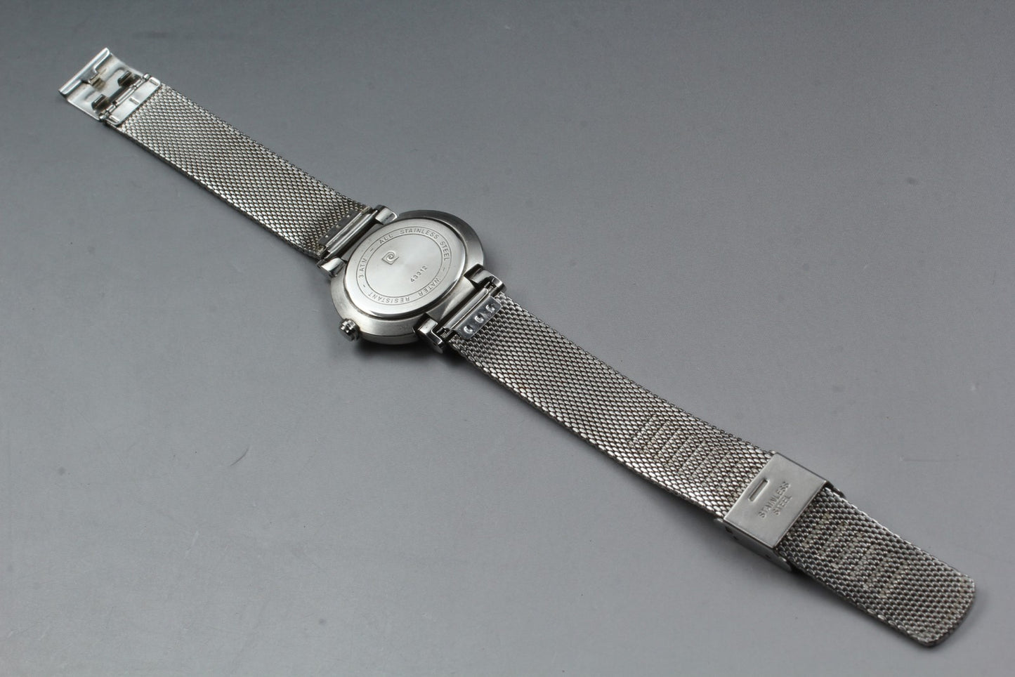Near MINT Pierre Cardin 43312 Black Cross Dial Silver Quartz 29mm Ladies Watch
