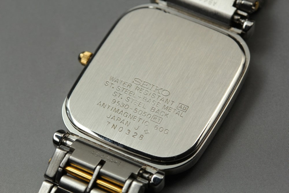 Near MINT SEIKO Dolce 9530-5050 White Quartz 25mm Men's Watch